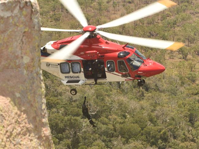 Lautaro Arellano getting winched to safety by a rescue helicopter off Mount Stuart. Picture: Evan Morgan