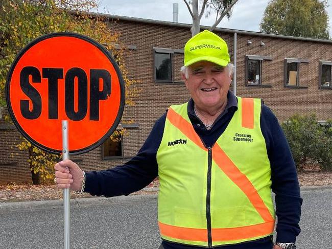 Yarra Ranges council crossing supervisor John Goulden has been described as an "infectious joy" by families but has been banned from high-fiving kids following a complaint from a parent. Picture: Facebook