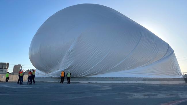 The 42-metre tall Domesilo cement storage dome being inflated at Hallett’s Green Cement Distribution Hub. Picture: Hallett Concrete