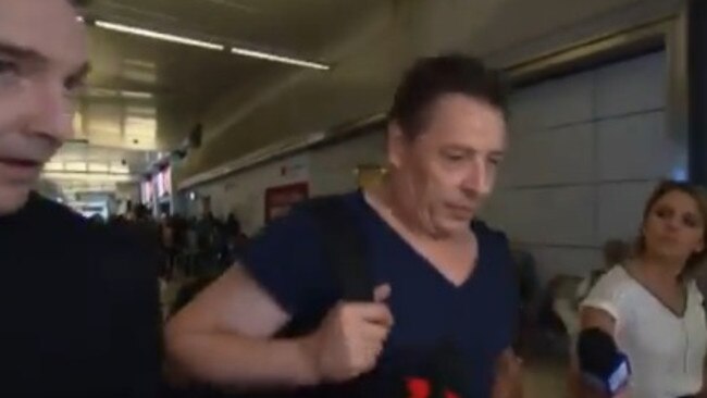 Mark 'Bomber' Thompson arrives at Los Angeles airport.