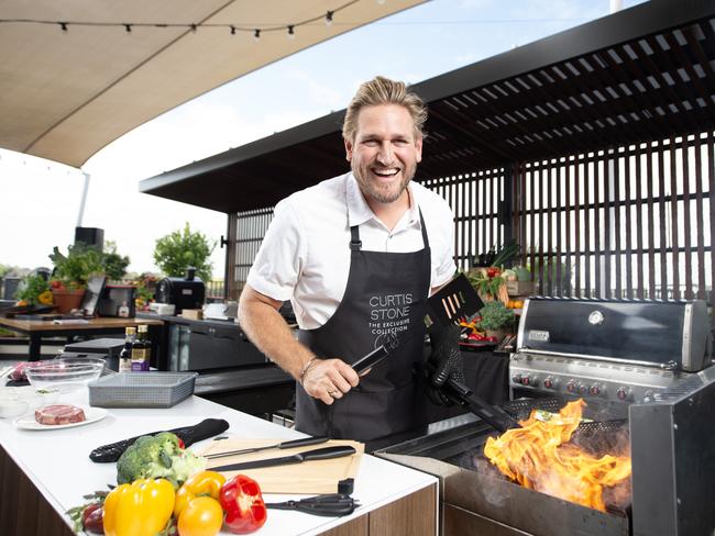 Curtis Stone with his new BBQ Collection that he created with Coles. Picture: Supplied