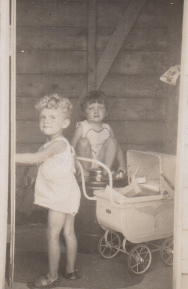 The twins playing together as children in Wollongong.