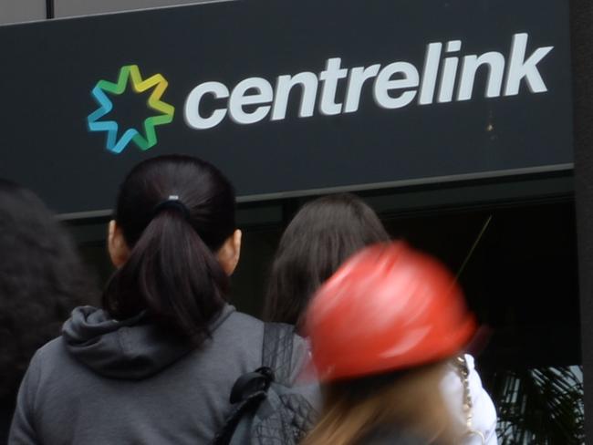 Generic photographs of people entering the Centrelink building in Bankstown NSW Australia (following a fire drill).