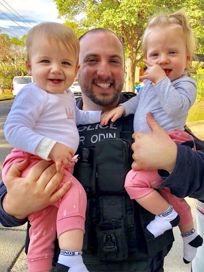 Mr Theoklis with his daughters.