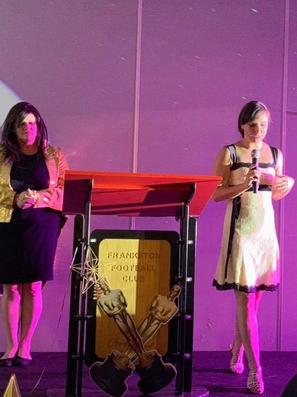 Rhiannon Pilton (L) stands next to Helena Blomeley (R) as Ms Blomley speaks at the Frankston Business Awards on February 21.