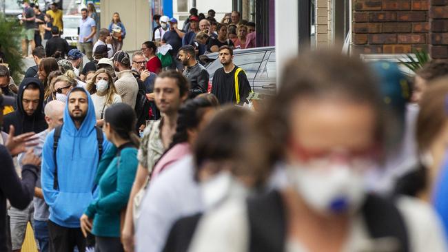 Lines of people at Centrelink in Bondi Junction on Monday. Picture: AAP