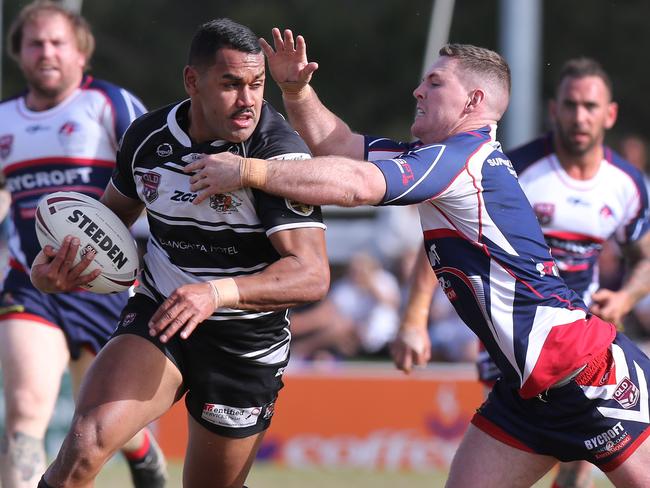 Runaway Bay’s John Mackin (right). Picture: Glenn Hampson