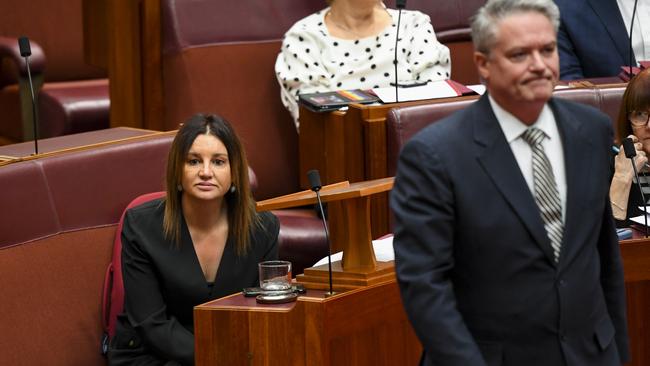 Senators Cormann and Lambie after their chat. Picture: AAP