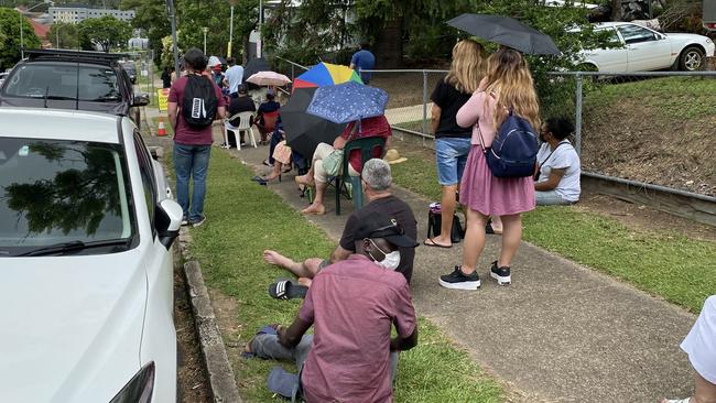 Some people waiting in line at Court St had to be brought food from family members as they waited in line for hours on end. Picture: Jessica Baker