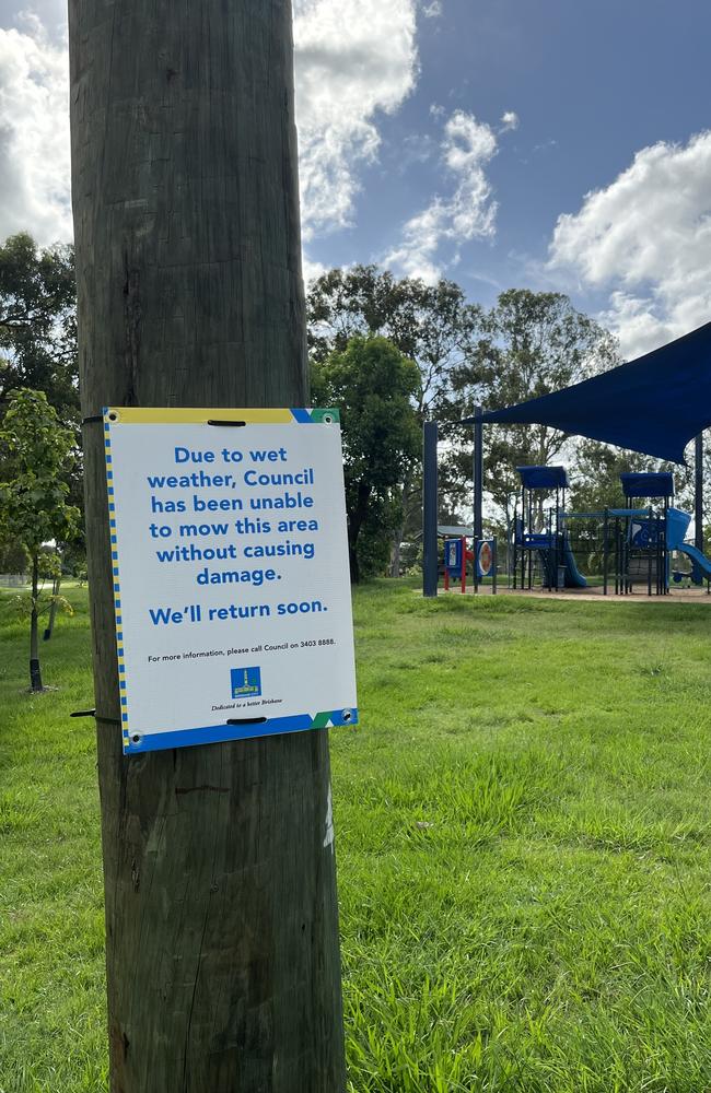 A council sign informing the public about the lack of mowing due to rain, at Fauna Parade Park in Rocklea. Picture: Councillor Steve Griffiths