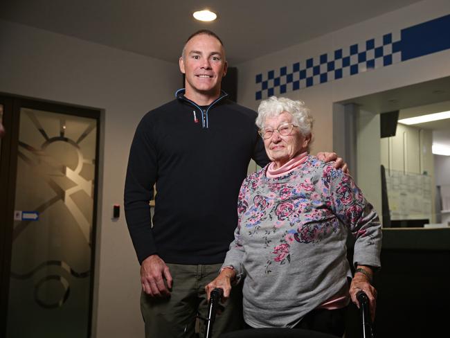 Navy clearance diver Chris Wright with Pat Andrews, who he rescued. Picture: Adam Yip / Manly Daily