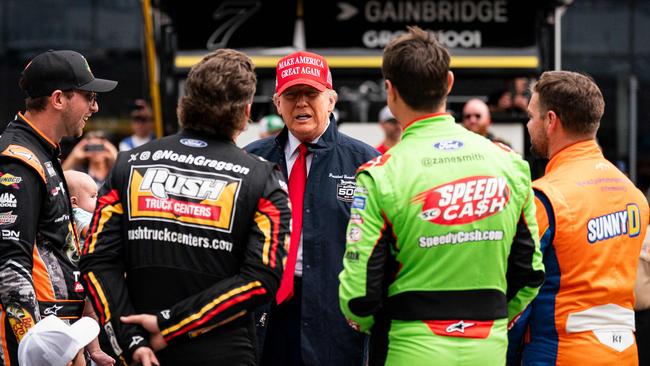 The President with drivers before the race. Picture: AFP