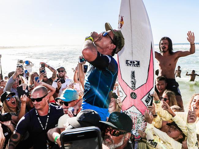 Julian Wilson celebrates winning the Quiksilver Pro on the Gold Coast on Thursday.