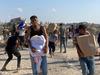 Chaos, looting mar start of new aid distribution system in Gaza