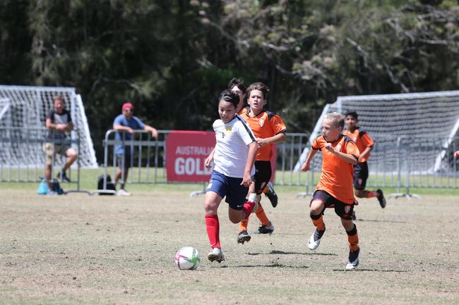 The Premier Invitational football tournament on the Gold Coast. Brisbane Roar Orange v TFC Brisbane White under-13s in action. Picture: Mike Batterham.