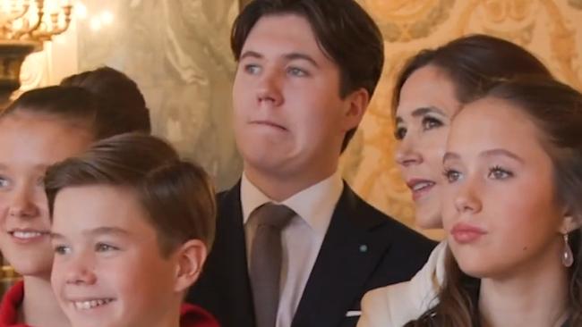 Princess Isabella, Prince Vincent, Prince Christian, Queen Mary and Princess Josephine watch as King Frederik walks out onto the balcony as king for the first time.