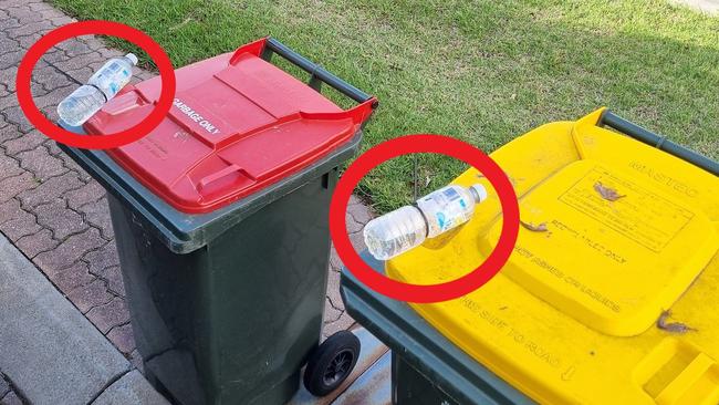 A local council is warning about the dangers of residents using items to weigh down their bins.