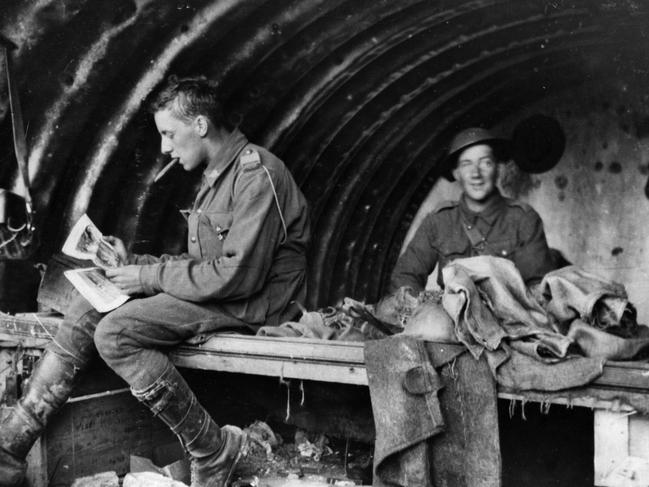 Gunners Baker and Harrington of the 16th Battery, Field Artillery, AIF, relaxing in a dugout.