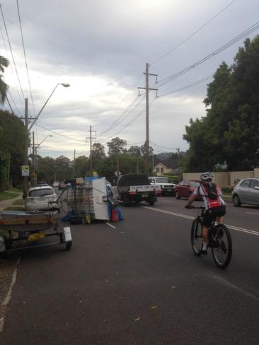 A trailer tipped on its side at Pittwater Road Mona Vale. Picture: Bill Ditmarsch