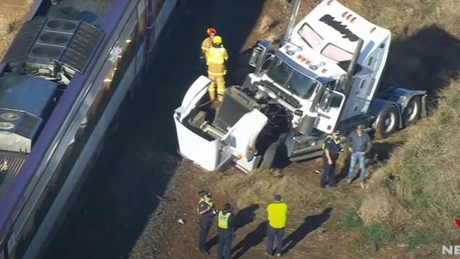 Authorities will launch a full investigation following a collision between a truck and train Wednesday morning. Picture: Seven News