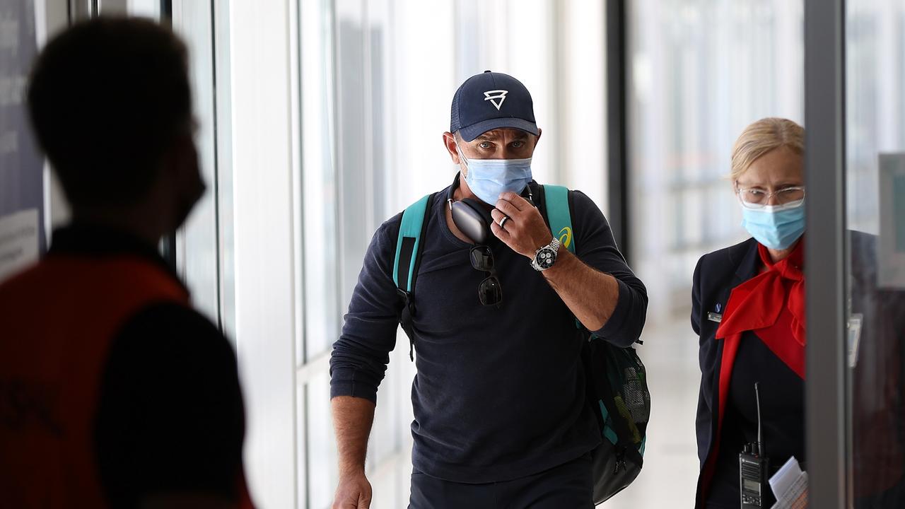 Justin Langer arrives at Perth Airport on Saturday. Picture: Paul Kane/Getty Images