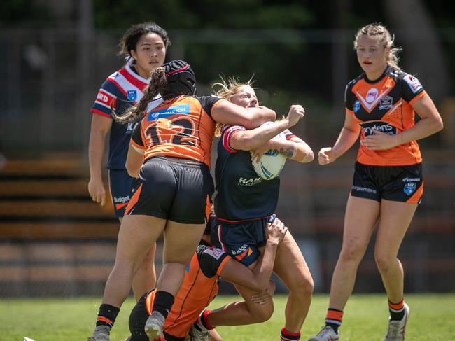 Iemaima Etuale was sent to the sin bin after this high tackle on Roosters player Lailani Montgomery. Picture: Julian Andrews