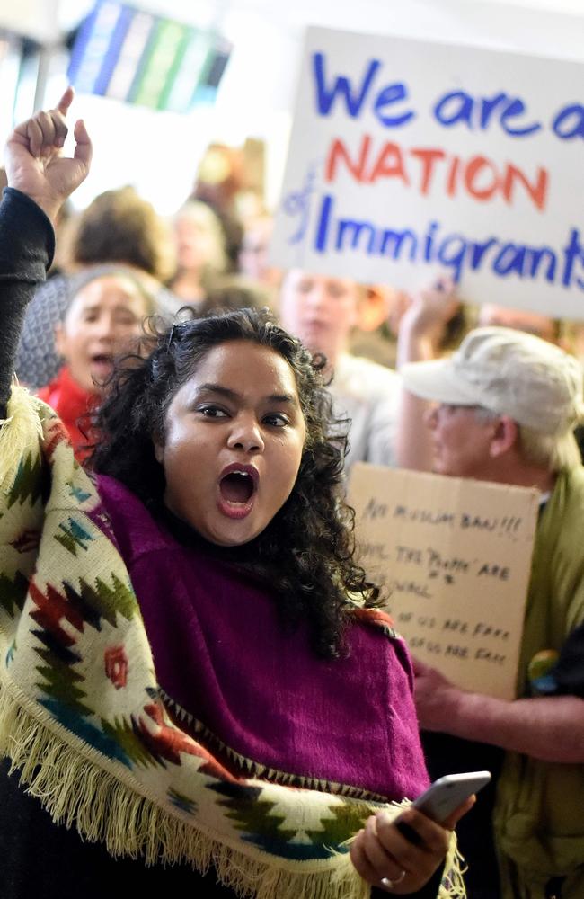 Thenmozhi Sonnd shouts along with protesters at San Francisco International Airport. Picture: AFP