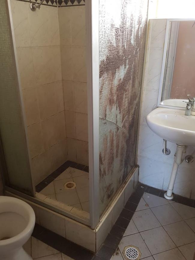 A grotty shower inside The Grandstand Hotel at Warwick Farm that was used by a child prostitution ring run by two sisters