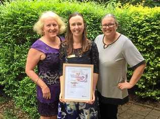 DEDICATION RECOGNISED: Lockyer District State High teacher Belinda Try, centre, holds her Certificate of Commendation that she was presented at a ceremony in Brisbane.