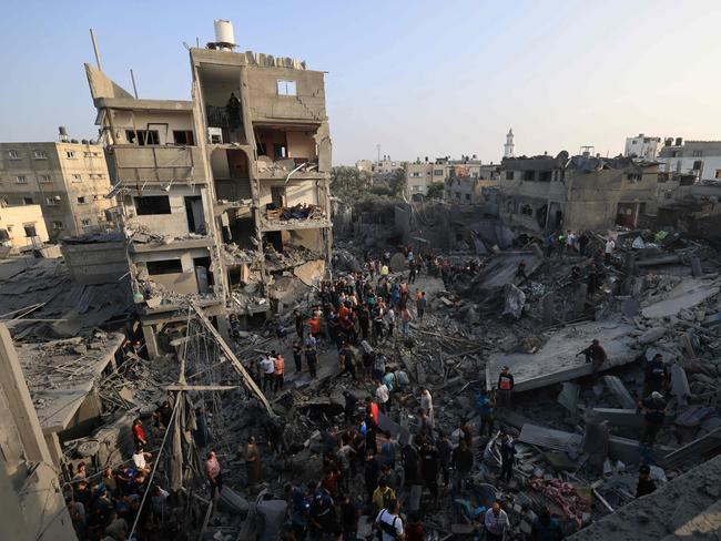 People check the damage caused by an Israeli strike on the Al-Maghazi refugee camp in Deir Balah in the central Gaza Strip. Picture: AFP