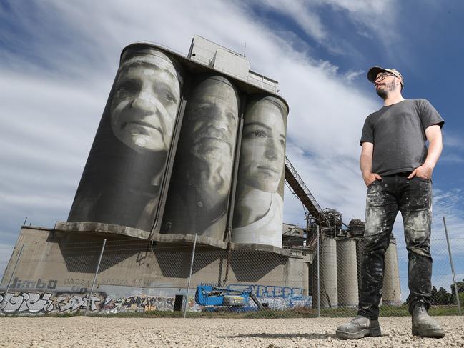 The before shot. Street artist "Rone" with his Fyansford Silos mural. Picture: Mark Wilson