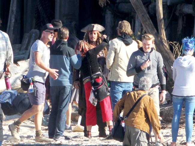 Johnny Depp between takes shooting scenes with The Dying Gull on the set of Pirates of the Caribbean: Dead Men Tell No Tales at The Spit. Pics Tim Marsden