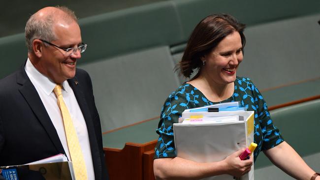 Kelly O’Dwyer strides into today’s Question Time alongside Prime Minister Scott Morrison today. Picture: Dean Lewins/AAP