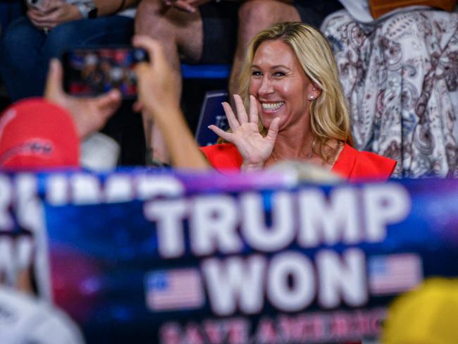 US Representative Marjorie Taylor Greene waves during a rally with former US President Donald Trump in Pennsylvania. Picture: AFP.