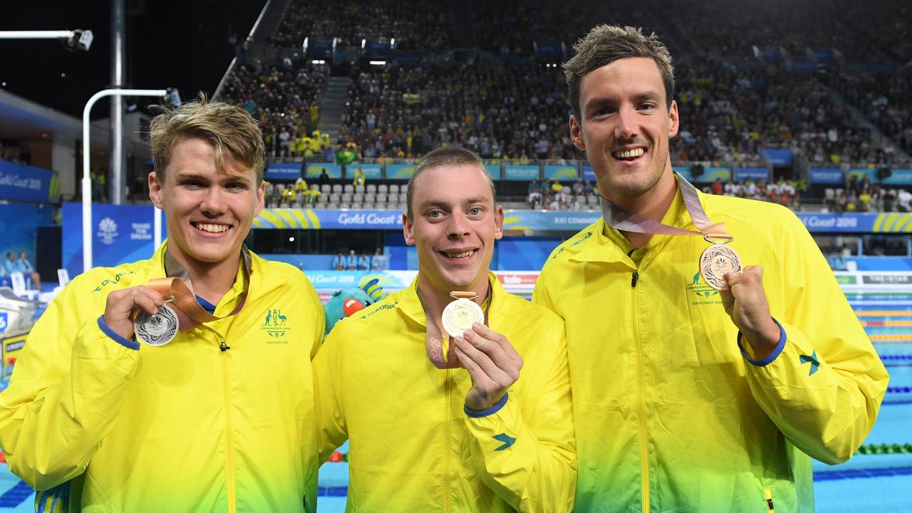 (L-R) Timothy Hodge, Timothy Disken and Blake Cochrane took all the medals at the Men's SB8 100m Breaststroke Final on day three of swimming competition at the Commonwealth Games. Picture: AAP Image/Dave Hunt.