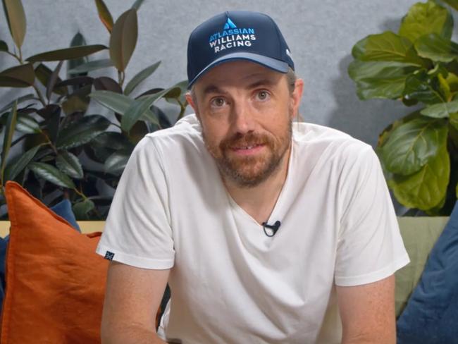 Atlassian co-founder and chief executive Mike Cannon-Brookes dons an Atlassian Williams Racing cap as he announces the new partnership.