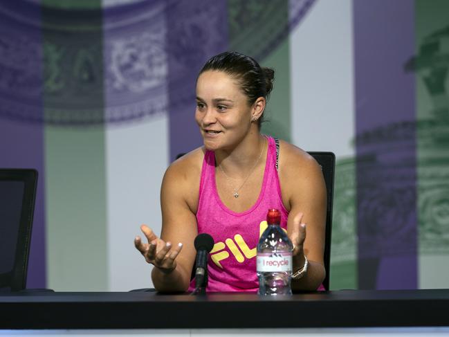 Australia's Ashleigh Barty smiles as she talks to the media during a press conference after losing her Women's singles match against United States' Alison Riske during day seven of the Wimbledon Tennis Championships in London, Monday, July 8, 2019. (Adam Warner, AELTC via AP)