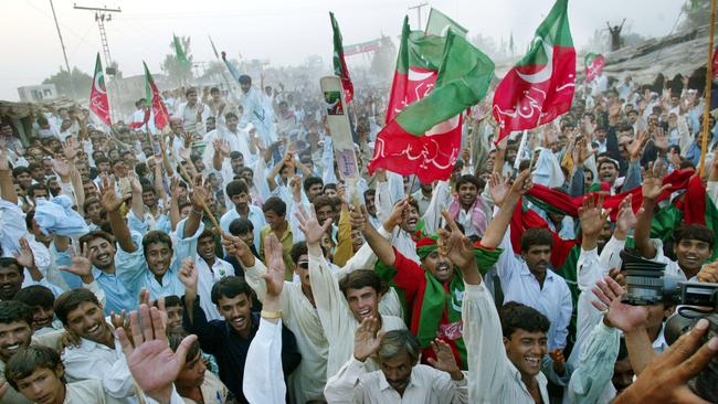 Supporters of Imran Khan at a rally in 2002. Picture: Paula Bronstein/Getty Images