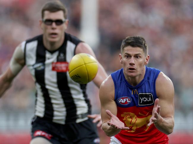 Lions veteran Dayne Zorko takes a mark in front of Collingwood’s Mason Cox in Brisbane’s one-point weekend loss. Picture: Daniel Pockett/Getty Images