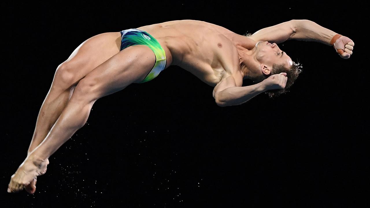 Domonic Bedggood on his way to winning gold in the 10m platform.