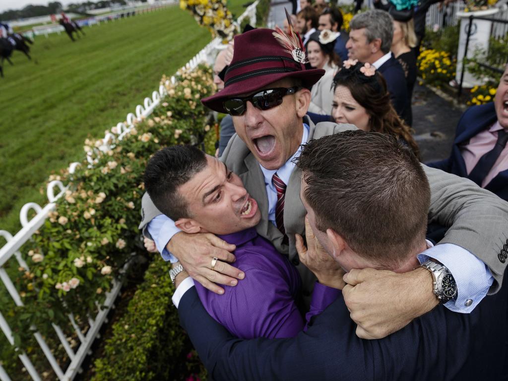 Connections of the winning Golden Slipper horse She Will Reign celebrate at Rosehill Gardens.