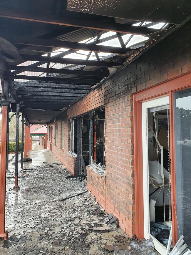 At least three businesses were damaged in a fire that broke out in Woodcroft this morning. Picture: Tom Angley