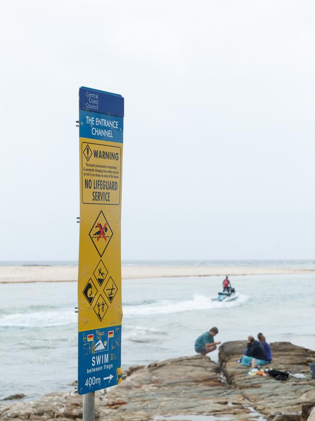 Safety warning signage along the water at The Entrance. Picture: Max Mason-Hubers