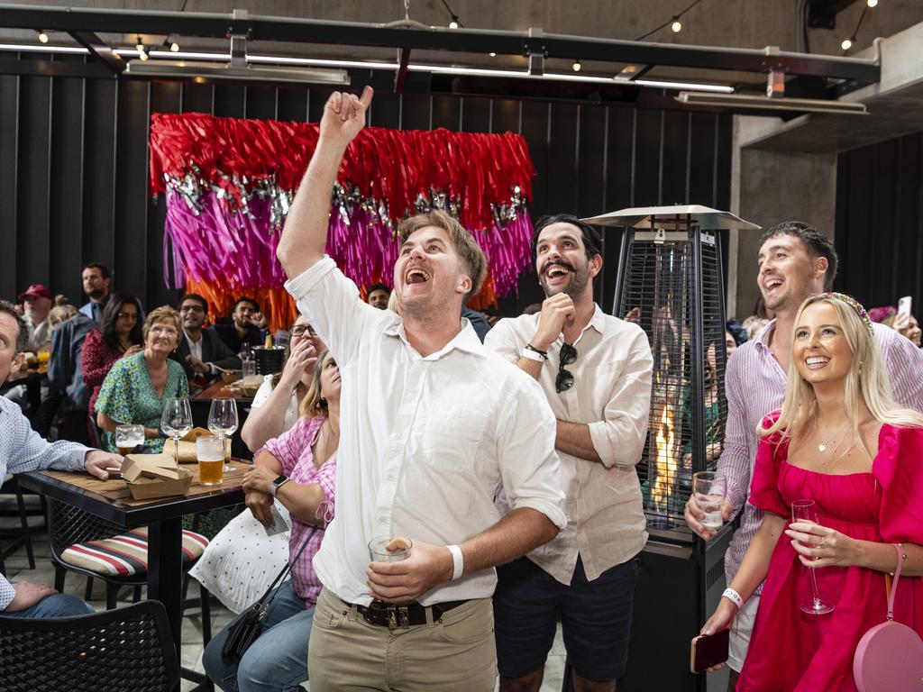 Riley Wockner (left) reacts after backing the winner with Callum Hart, Chris Hall and Holly Walker at The Rock Melbourne Cup party, Tuesday, November 1, 2022. Picture: Kevin Farmer