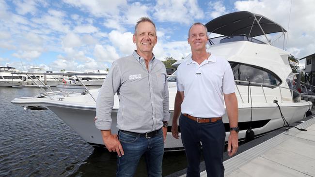 Johan Hasser, General Manager of Sanctuary Cove International Boatshow, with Riviera owner Rodney Longhurst. Photo by Richard Gosling / RCG Images