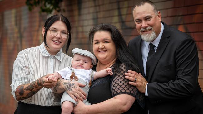 Belinda Nuske, holding baby Emmett, with husband Keiron Nuske (right) and surrogate mother Helina Michalski (left). Picture: NCA NewsWire / Naomi Jellicoe