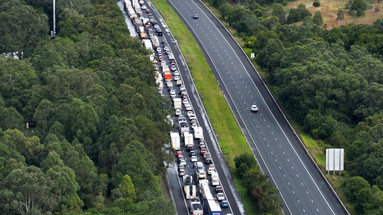 Truck driver charged over 840kg metal scrap spill along highway