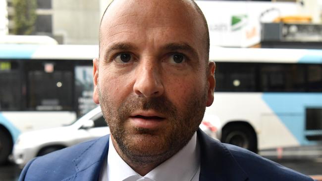 George Calombaris outside court after admitted to assaulting a teenage football fan. Picture: AAP