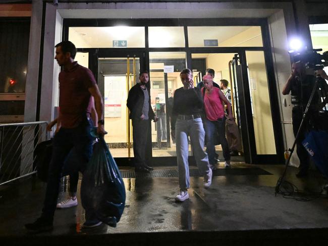 Police carry evidence out of a refugee accommodation in Solingen, western Germany, during the investigation following the deadly knife attack, allegedly by a Syrian national. Picture: AFP