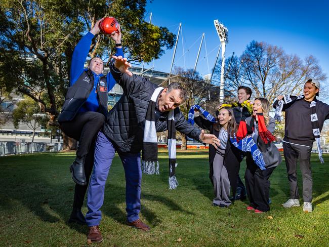 Tahlia Randall takes a Specky over Peter Daicos while footy fans Kelsie Gaffey, Molly O’Neill, Jack de Steiger and Taylor Harrison cheer on. The prizes for goal and mark of the year have been upped this season. Picture: Jake Nowakowski